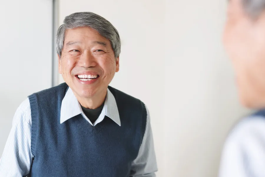 Patient smiling during a dental consultation
